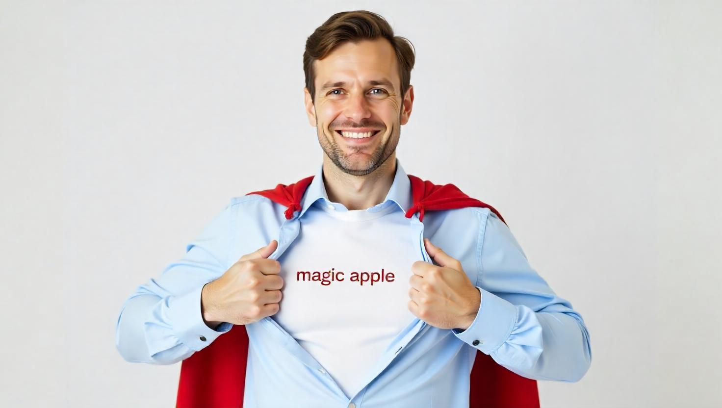 Man with cape, showing magic apple on t-shirt conveying Magic Apples exceptional customer support.