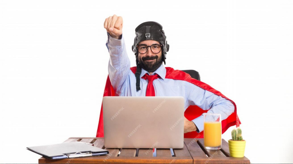 Man in super hero costume at laptop. Conveys The best customer support software for small business teams and seamless service